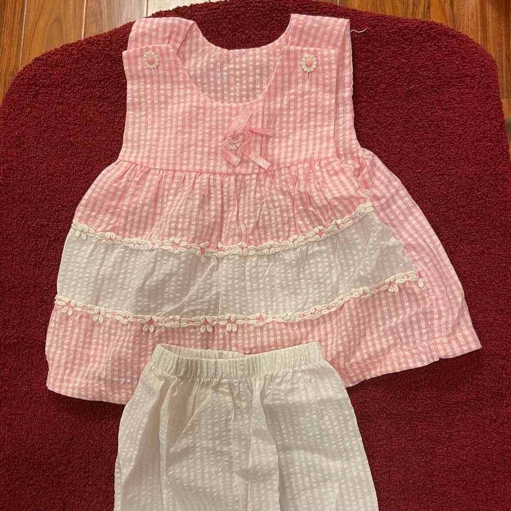 Small Steps newborns matching pink & white 2-piece top and long-short bottoms.